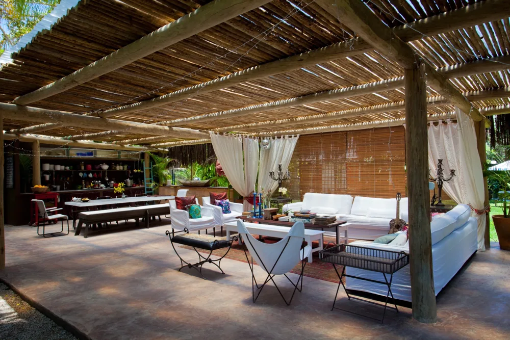 Timber, textiles and garden in the open lounge