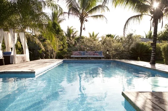 Light through the palms beside the Casas da Vila pool