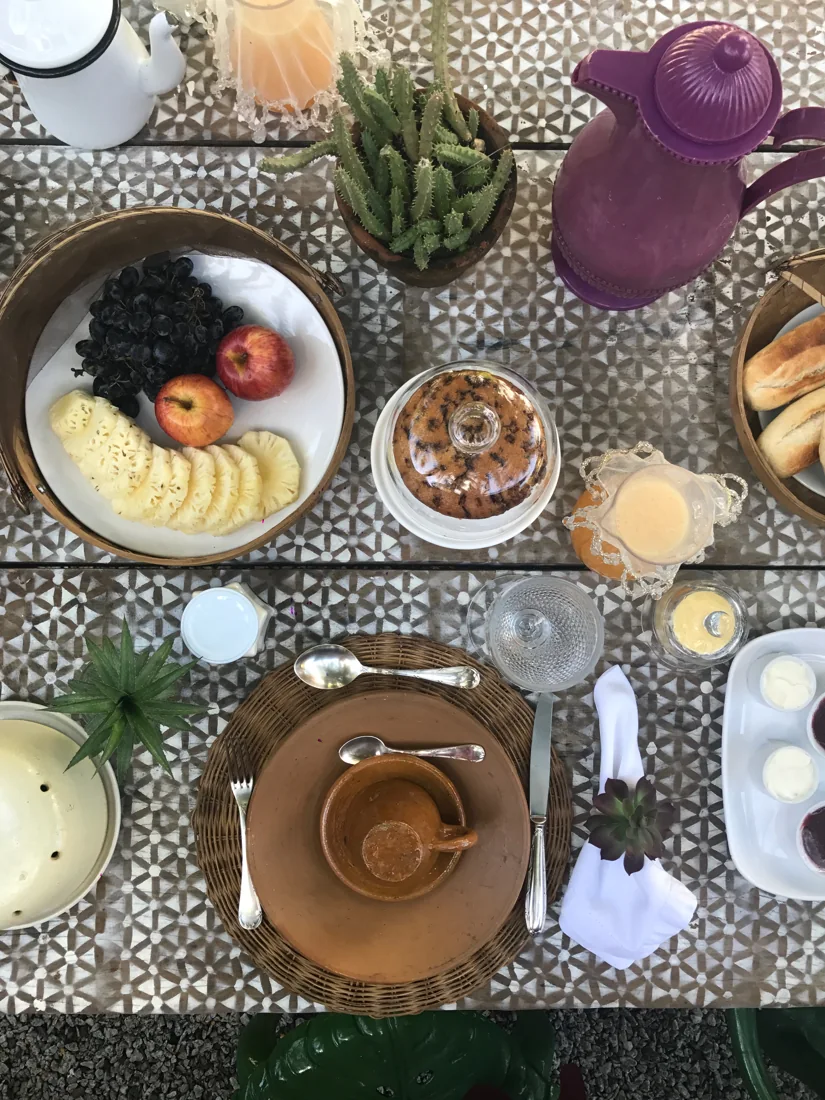 Fruit, coffee and ceramics at breakfast
